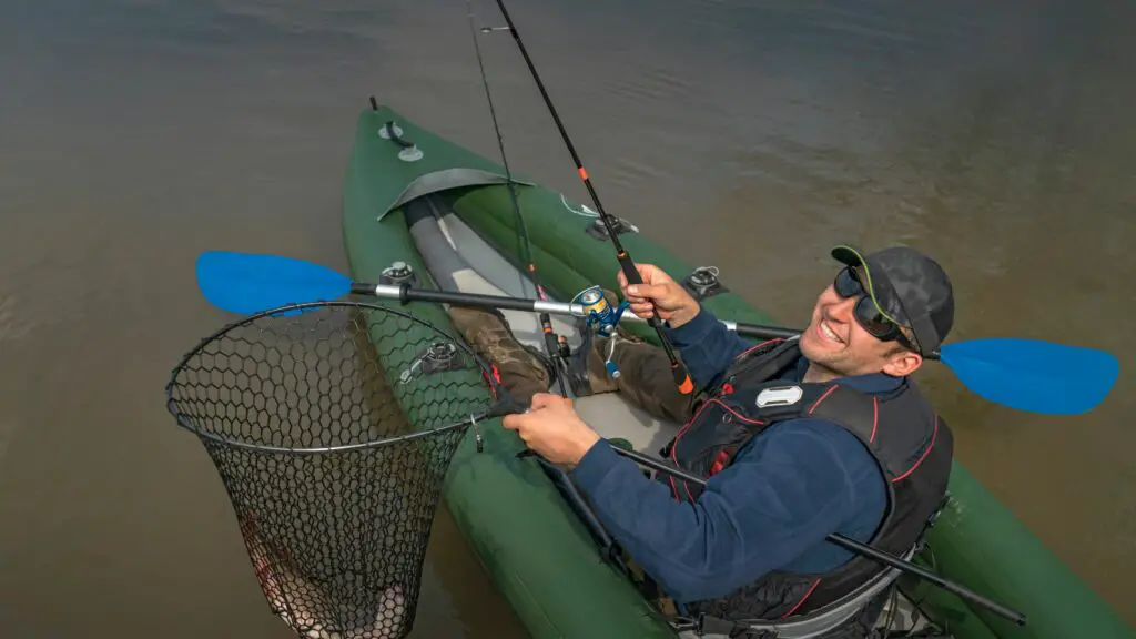 inflatable kayak with man fishing